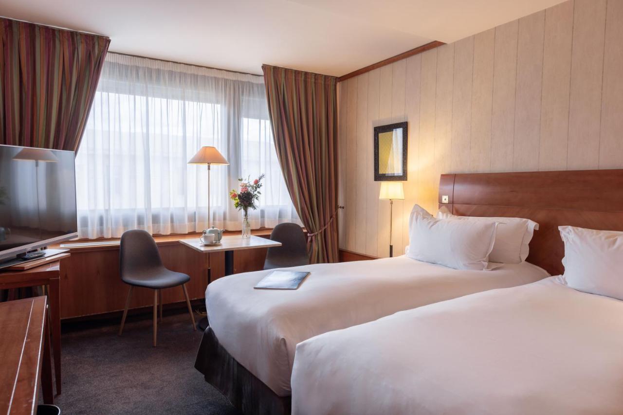 Sofitel Lyon Bellecour Hotel Exterior foto A typical room at the hotel